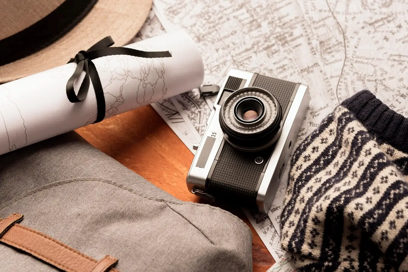 Overhead view of a travel concept with a photo camera